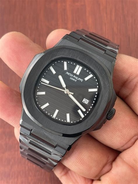 patek philippe nautilus negro|Patek Philippe Nautilus original price.